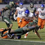 Baylor safety Orion Stewart (28) intercepts a pass in the end zone as Boise State wide receiver Thomas Sperbeck makes the tackle and lineman Will Adams (72) defends during the first half of the Cactus Bowl NCAA college football game, Tuesday, Dec. 27, 2016, in Phoenix. (AP Photo/Rick Scuteri)