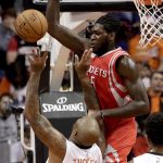 Houston Rockets forward Montrezl Harrell (5) blocks the shot of Phoenix Suns forward P.J. Tucker (17) during the first half of an NBA basketball game, Wednesday, Dec. 21, 2016, in Phoenix. (AP Photo/Matt York)