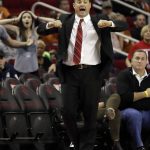 Arizona coach Sean Miller yells toward the officials during the second half of an NCAA college basketball game against the Texas A&M, Saturday, Dec. 17, 2016, in Houston. Arizona won 67-63. (AP Photo/David J. Phillip)