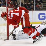 Arizona Coyotes goalie Mike Smith (41) stops a Detroit Red Wings center Andreas Athanasiou (72) shot in the second period of an NHL hockey game, Tuesday, Dec. 13, 2016, in Detroit. (AP Photo/Paul Sancya)