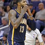 Indiana Pacers forward Paul George blows kisses to the crowd after making a 3-pointer against the Phoenix Suns during the second half of an NBA basketball game Wednesday, Dec. 7, 2016, in Phoenix. The Pacers defeated the Suns 109-94. (AP Photo/Ross D. Franklin)