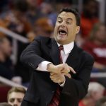 Arizona coach Sean Miller yells at the officials during the first half of an NCAA college basketball game against the Texas A&M, Saturday, Dec. 17, 2016, in Houston. (AP Photo/David J. Phillip)