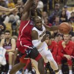 Missouri's Terrence Phillips, right, dribbles past Arizona's Kadeem Allen, left, during the first half of an NCAA college basketball game Saturday, Dec. 10, 2016, in Columbia, Mo. Arizona won the game 79-60. (AP Photo/L.G. Patterson)
