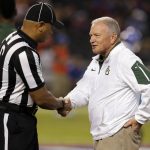 Baylor coach Jim Grobe greets an official prior to the team's Cactus Bowl NCAA college football game against Boise State, Tuesday, Dec. 27, 2016, in Phoenix. (AP Photo/Rick Scuteri)