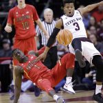 Texas A&M's Admon Gilder (3) collides with Arizona's Rawle Alkins (1) while chasing a loose ball during the first half of an NCAA college basketball game, Saturday, Dec. 17, 2016, in Houston. (AP Photo/David J. Phillip)