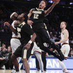 Purdue forward Vince Edwards (12) goes up for a shot against Arizona State in the second half of an NCAA college basketball game, Tuesday, Dec. 6, 2016, in New York. Purdue won 97-64. (AP Photo/Julie Jacobson)
