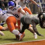 Baylor running back JaMycal Hasty scores a touchdown as Boise State linebackers Leighton Vander Esch (38) and Blake Whitlock (36) defend during the first half of the Cactus Bowl NCAA college football game, Tuesday, Dec. 27, 2016, in Phoenix. (AP Photo/Rick Scuteri)
