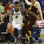 Creighton guard Marcus Foster (0) advances the ball past Arizona State's Kodi Justice during the second half of an NCAA college basketball game, Tuesday, Dec. 20, 2016, in Tempe, Ariz. Creighton defeated Arizona State 96-85. (AP Photo/Ralph Freso)