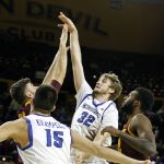 Creighton forward Toby Hegner (32) shoots over Arizona State's Ramon Vila, left, during the first half of an NCAA college basketball game, Tuesday, Dec. 20, 2016, in Tempe, Ariz. (AP Photo/Ralph Freso)
