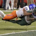 Baylor wide receiver Ishmael Zamora (8) scores a touchdown as Boise State safety Cameron Hartsfield (37) defends during the second half of the Cactus Bowl NCAA college football game, Tuesday, Dec. 27, 2016, in Phoenix. (AP Photo/Matt York)