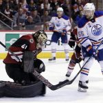Arizona Coyotes goalie Mike Smith (41) makes the save in front of Edmonton Oilers center Mark Letestu (55) in the first period during an NHL hockey game, Wednesday, Dec. 21, 2016, in Glendale, Ariz. (AP Photo/Rick Scuteri)