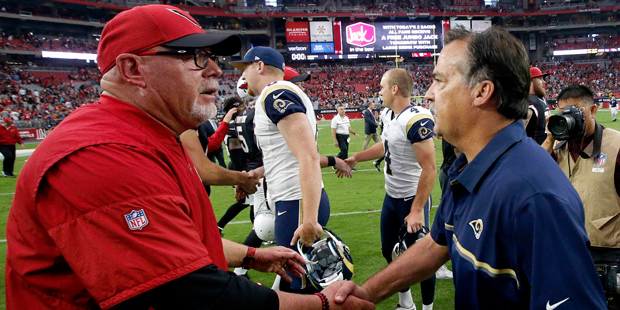 Arizona Cardinals head coach Bruce Arians greets Los Angeles Rams head coach Jeff Fisher, right, af...