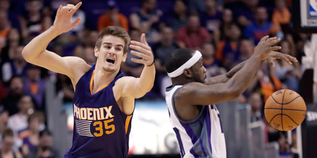 Phoenix Suns forward Dragan Bender (35), of Croatia, and Sacramento Kings guard Ty Lawson (10) batt...