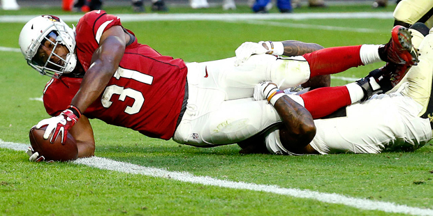 Arizona Cardinals running back David Johnson (31) scores a touchdown as New Orleans Saints cornerba...