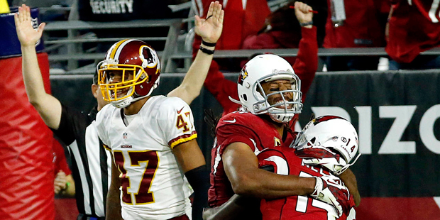 Arizona Cardinals wide receiver J.J. Nelson (14) celebrates his touchdown with Larry Fitzgerald as ...