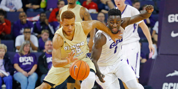 Alcorn State guard Avery Patterson (15) and Grand Canyon guard Fiifi Aidoo (1) compete for the ball...
