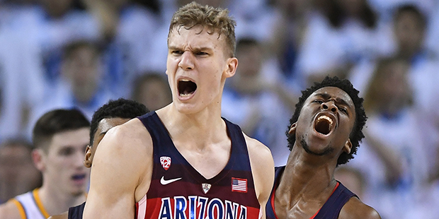 Arizona forward Lauri Markkanen, left, and guard Kobi Simmons celebrate after they scored late in t...