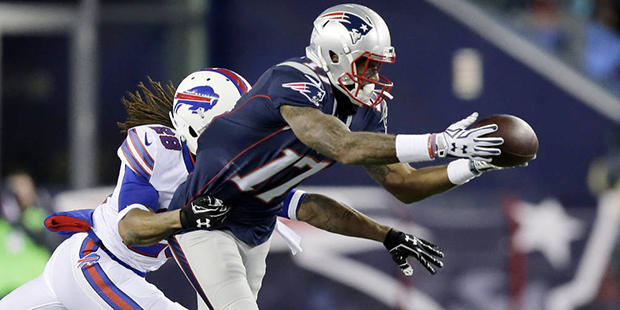 New England Patriots wide receiver Aaron Dobson (17) catches a pass with Buffalo Bills defensive ba...