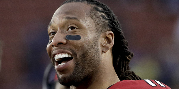 Arizona Cardinals wide receiver Larry Fitzgerald smiles during the second half of an NFL football g...