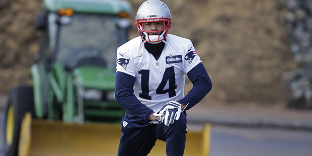 New England Patriots wide receiver Michael Floyd stretches while warming up during an NFL football ...
