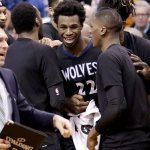 Minnesota Timberwolves forward Andrew Wiggins (22) celebrates with his teammates after making the game winning basket against the Phoenix Suns during the second half of an NBA basketball game, Tuesday, Jan. 24, 2017, in Phoenix. The Timberwolves won 112-111. (AP Photo/Matt York)