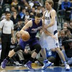 Phoenix Suns' Alex Len of Ukraine positions for an opportunity to the basket as Dallas Mavericks' Dirk Nowitzki of Germany defends in the first half of an NBA basketball game, Thursday, Jan. 5, 2017, in Dallas. (AP Photo/Tony Gutierrez)