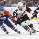 Arizona Coyotes' Shane Doan (19) is chased by Edmonton Oilers' Mark Letestu (55) during first period NHL hockey action in Edmonton, Alberta, Monday Jan. 16, 2017. (Jason Franson/The Canadian Press via AP)