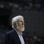 San Antonio Spurs head coach Gregg Popovich watches the game against Phoenix in the first half of their regular-season NBA basketball game in Mexico City, Saturday, Jan. 14, 2017. (AP Photo/Rebecca Blackwell)