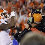 Clemson's Deshaun Watson reacts after rushing for a touchdown during the first half of the NCAA college football playoff championship game against Alabama Monday, Jan. 9, 2017, in Tampa, Fla. (AP Photo/Chris O'Meara)