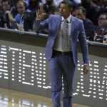 Phoenix Suns head coach Earl Watson gestures from the sidelines of a regular-season NBA basketball game with the Dallas Mavericks, during the first half in Mexico City, Thursday, Jan. 12, 2017. (AP Photo/Rebecca Blackwell)