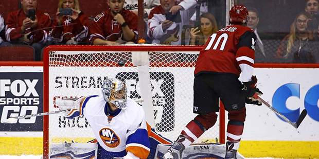 Arizona Coyotes left wing Anthony Duclair (10) scores a goal against New York Islanders goalie Thom...