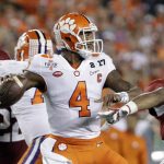 Clemson's Deshaun Watson throws during the first half of the NCAA college football playoff championship game against Alabama Monday, Jan. 9, 2017, in Tampa, Fla. (AP Photo/David J. Phillip)