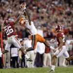 Clemson's Mike Williams catches a pass in front of Alabama's Marlon Humphrey during the second half of the NCAA college football playoff championship game Tuesday, Jan. 10, 2017, in Tampa, Fla. (AP Photo/Chris O'Meara)