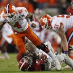 Clemson's Deshaun Watson is sacked by Alabama's Reuben Foster during the first half of the NCAA college football playoff championship game Monday, Jan. 9, 2017, in Tampa, Fla. (AP Photo/John Bazemore)