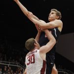 Arizona's Lauri Markkanen shoots as Stanford's Grant Verhoeven (30) defends during the first half of an NCAA college basketball game, Sunday, Jan. 1, 2017, in Stanford, Calif. (AP Photo/George Nikitin)