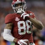 Alabama's O.J. Howard celebrates his touchdown catch during the second half of the NCAA college football playoff championship game against Clemson Monday, Jan. 9, 2017, in Tampa, Fla. (AP Photo/Chris O'Meara)