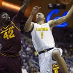 California's Ivan Rabb (1) drives to the hoop past Arizona State's Jethro Tshisumpa (42) during the first half of an NCAA college basketball game Sunday, Jan. 1, 2017, in Berkeley, Calif. (AP Photo/D. Ross Cameron)