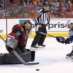 Arizona Coyotes goalie Mike Smith (41) makes a save on a shot by Winnipeg Jets right wing Blake Wheeler (26) during the second period of an NHL hockey game Friday, Jan. 13, 2017, in Glendale, Ariz. (AP Photo/Ross D. Franklin)