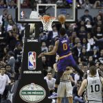 Phoenix Suns Marquese Chriss does a layup against the San Antonio Spurs in the first half of their regular-season NBA basketball game in Mexico City, Saturday, Jan. 14, 2017. (AP Photo/Rebecca Blackwell)