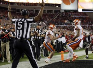 Clemson's Hunter Renfrow celebrates after catching a touchdown during the second half of the NCAA college football playoff championship game against Alabama Tuesday, Jan. 10, 2017, in Tampa, Fla. (AP Photo/David J. Phillip)