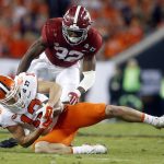 Clemson's Hunter Renfrow catches a pass in front of Alabama's Rashaan Evans during the first half of the NCAA college football playoff championship game Monday, Jan. 9, 2017, in Tampa, Fla. (AP Photo/John Bazemore)