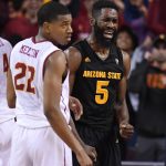 Arizona State forward Obinna Oleka, right, reacts after turning over the ball as Southern California guard De'Anthony Melton looks on during the second half of an NCAA college basketball game, Sunday, Jan. 22, 2017, in Los Angeles. USC won 82-79. (AP Photo/Mark J. Terrill)