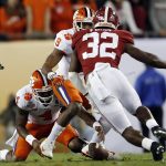 Clemson's Deshaun Watson fumbles during the first half of the NCAA college football playoff championship game against Alabama Monday, Jan. 9, 2017, in Tampa, Fla. Alabama's Ryan Anderson recovered the fumble. (AP Photo/John Bazemore)