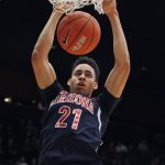 Arizona's Chance Comanche dunks against Stanford during the first half of an NCAA college basketball game, Sunday, Jan. 1, 2017, in Stanford, Calif. (AP Photo/George Nikitin)