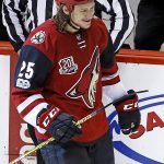 Arizona Coyotes center Ryan White smiles after scoring a goal against the Florida Panthers during the second period of an NHL hockey game, Monday, Jan. 23, 2017, in Glendale, Ariz. (AP Photo/Ross D. Franklin)