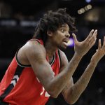 Toronto Raptors center Lucas Nogueira (92) reacts after he was called for a foul during the second half of an NBA basketball game against the San Antonio Spurs, Tuesday, Jan. 3, 2017, in San Antonio. San Antonio won 110-82.(AP Photo/Eric Gay)