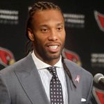 In this Oct. 17, 2016, file photo, Arizona Cardinals wide receiver Larry Fitzgerald (11) speaks after an NFL football game against the New York Jets, in Glendale, Ariz. Fitzgerald, Miami's Mike Pouncey and the New York Jets' Brandon Marshall are among the 32 players eligible for the Walter Payton NFL Man of the Year Award.
