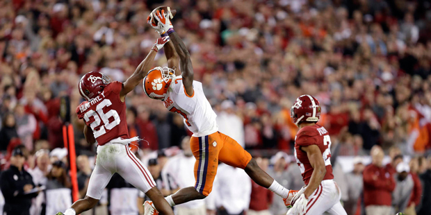 Clemson's Mike Williams catches a pass in front of Alabama's Marlon Humphrey during the second half...