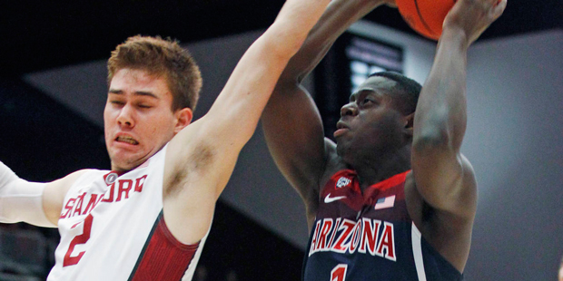 Arizona's Rawle Alkins (1) shoots as Stanford's Robert Cartwright defends during the first half of ...