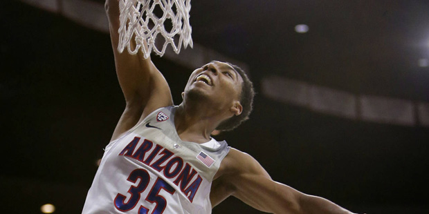 Arizona guard Allonzo Trier dunks during the second half of an NCAA college basketball game against...